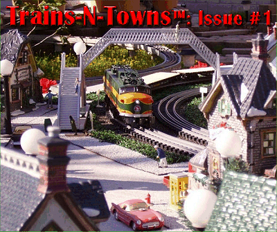 Trains-N-Towns. The official e-newsletter of Big Indoor Trains<sup><small>TM</small></sup> and Big Christmas Trains<sup><small>TM</small></sup> - Bringing you news about O Gauge, On30, and Christmas trains, and the model communities they serve. This photo shows an O gauge railroad that uses ceramic buildings and runs OUTDOORS. Click for bigger photo.